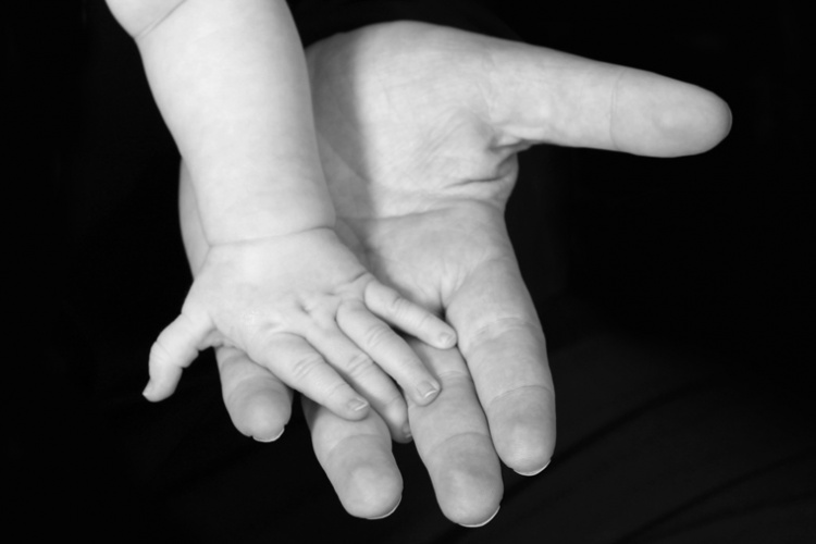 Daughter's hand by Sharif Mohammadi
